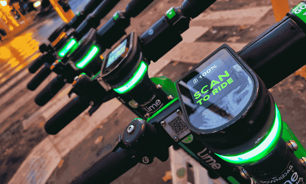 A green and black smart mobility scooter
