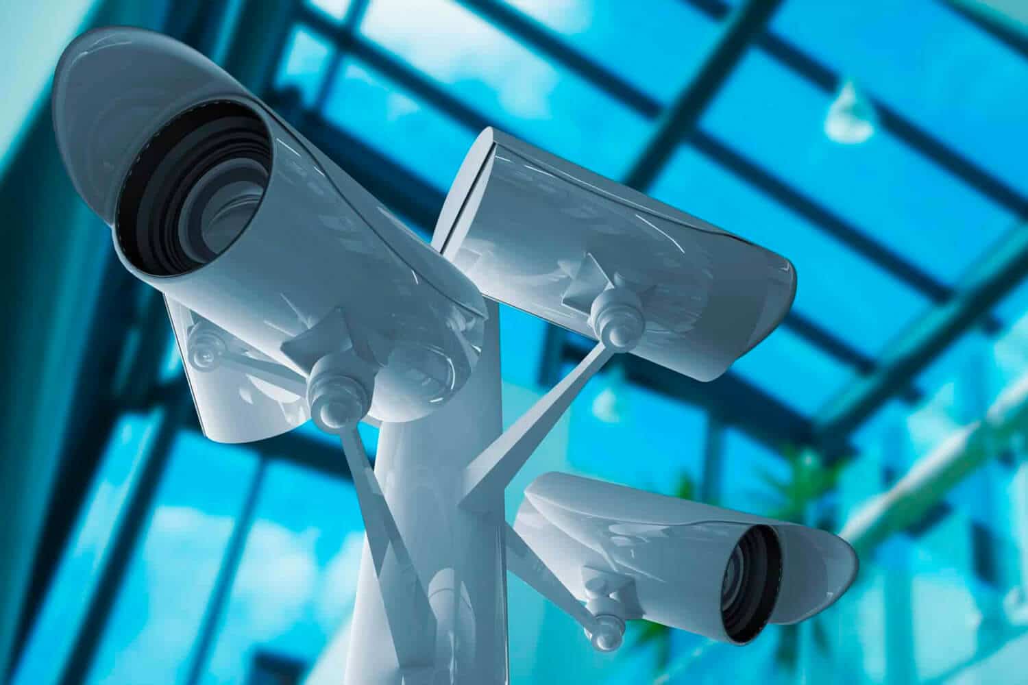 Indoor CCTV security camera with a sky blue background