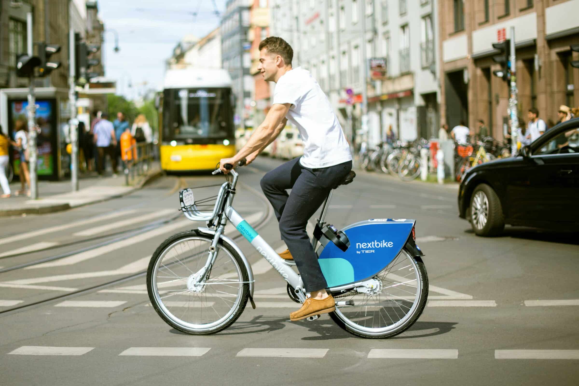 micromobility - person using rental electric bike